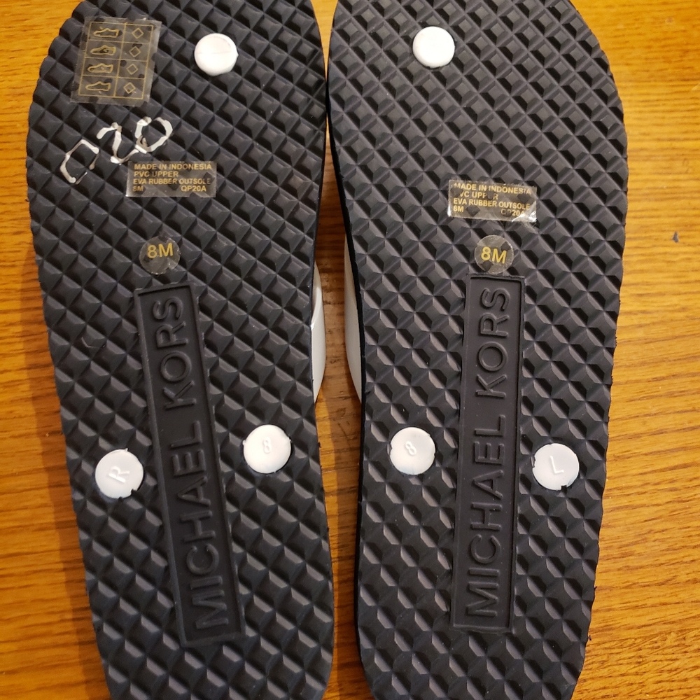 Micheal Kors flip flops